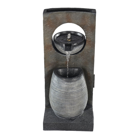 Simulated stone waterfall feature