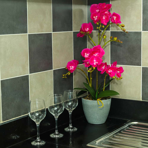 Artificial orchid plants in pots
