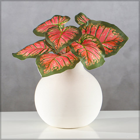 Lifelike caladium plant leaves
