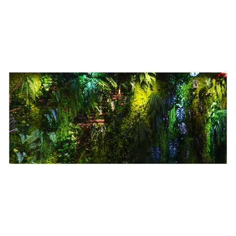 Jungle themed wall decor with greenery