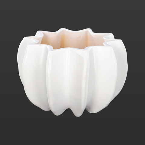 White ceramic pumpkin design vase