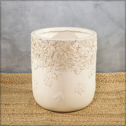 round planter with leaf design
