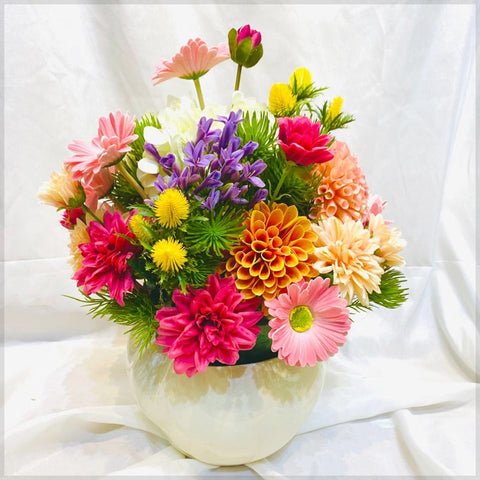 Colorful Blossom Symphony in a Elegant Vase