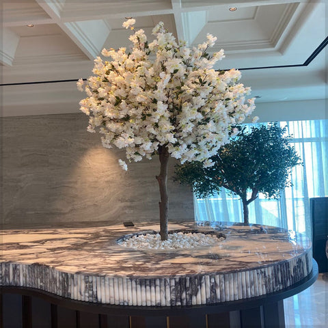 Elegant Indoor Floral Display with Cherry Blossom Tree