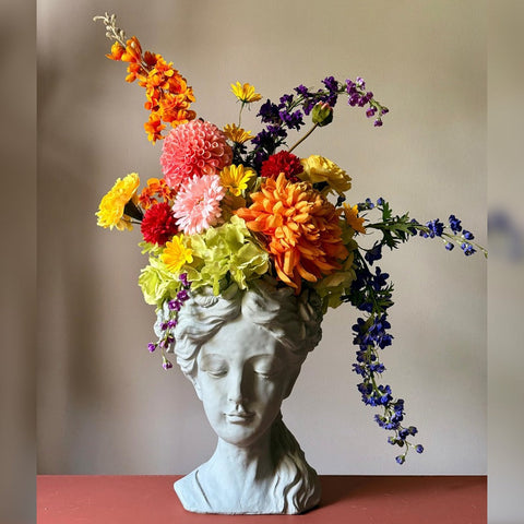 Vibrant Floral Art in a Sculptural Vase