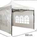 Heavy-duty pop up canopy tent with sides offering shelter at a trade show