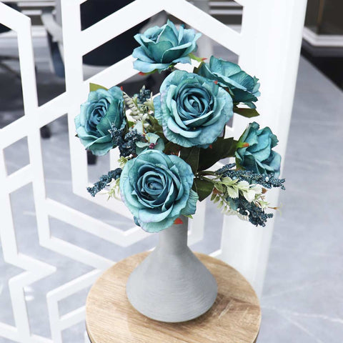 Faux multi-coloured roses for garden