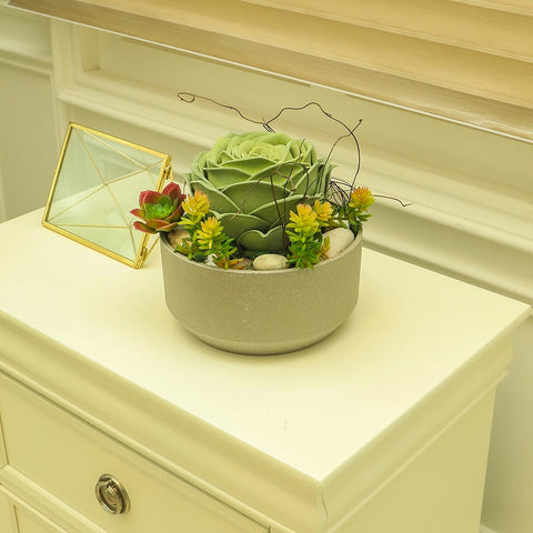 Green faux succulent plant with pot