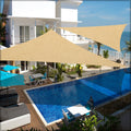 Sun shade sail triangle above a pool