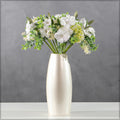 faux begonia and allium arrangement