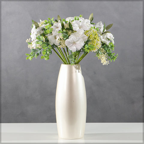 faux begonia and allium arrangement