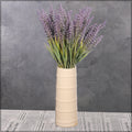 Decorative cream vase for flowers and greenery