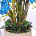 Faux blue orchid centerpiece