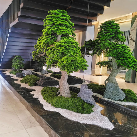 bonsai plant arrangement with fresh moss wall
