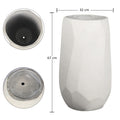 White vase with geometric design