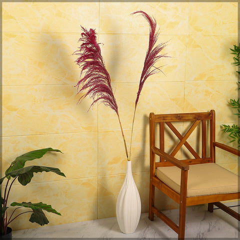 Dried pampas grass in a tall vase for home décor