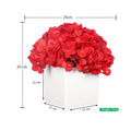 hydrangea arrangement in white vase