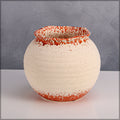 Stylish orange white ceramic planter for contemporary interiors