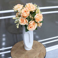 Artificial multi-coloured rose bush flower