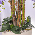 Faux purple orchid centerpiece