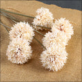 Small artificial dandelion flowers