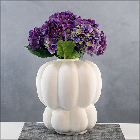 Sculptural ceramic vase for floral arrangements