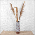 Decorative antique metal vase for interiors