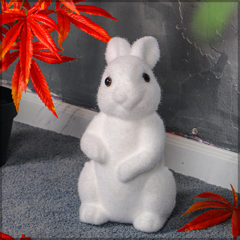 Moss rabbit garden statue