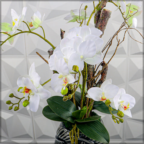 Faux orchid arrangement